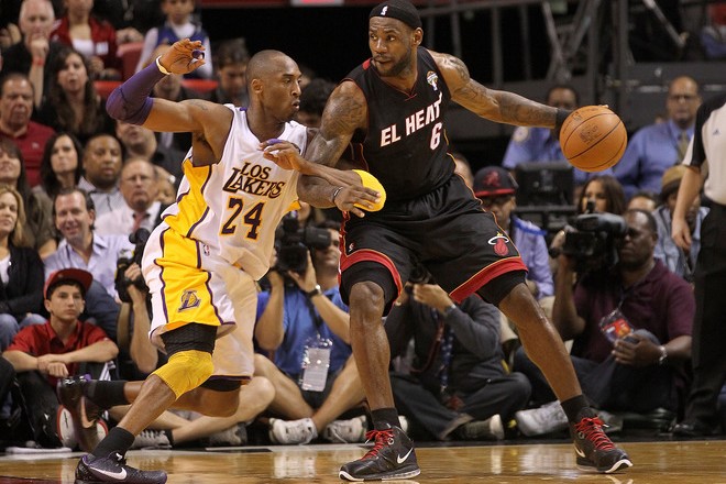 Kobe in Nike Zoom Kobe VI Black/Dark Grey defends LeBron in Nike LeBron 8 PE
