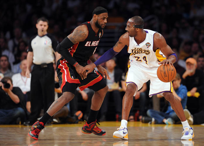 LeBron in Nike LeBron 9 "Fairfax" PE guards Kobe in Nike Kobe VII White/Del Sol
