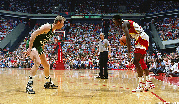 Larry Bird in Converse ERX-400 and Dominique Wilkins in Brooks Highlight
