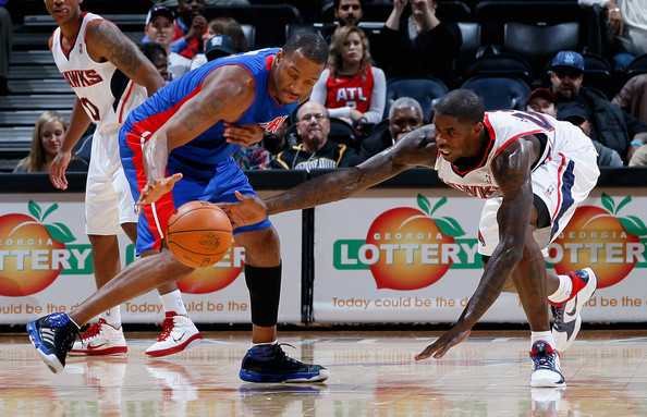 Tracy McGrady wearing the adidas adizero Infiltrate