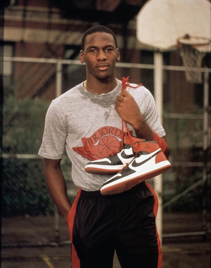 Michael Jordan wearing the Wings Jordan logo shirt.