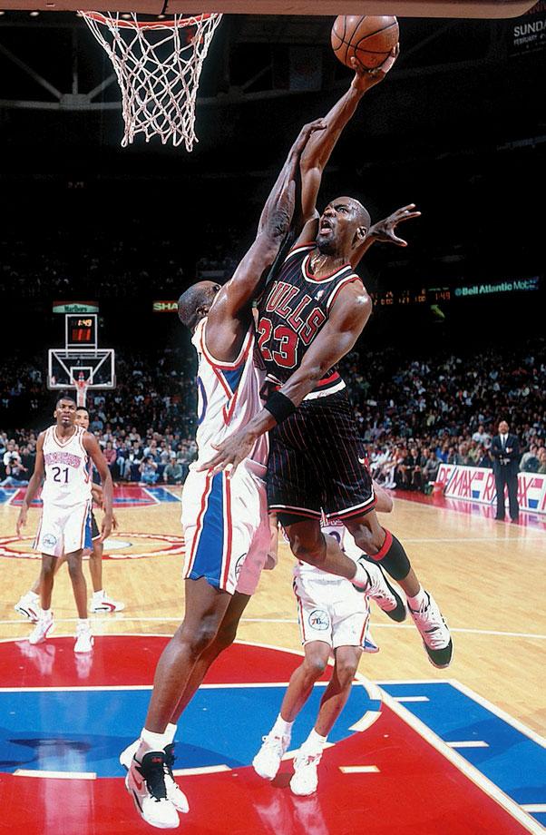 Michael Jordan dunking against the 76ers