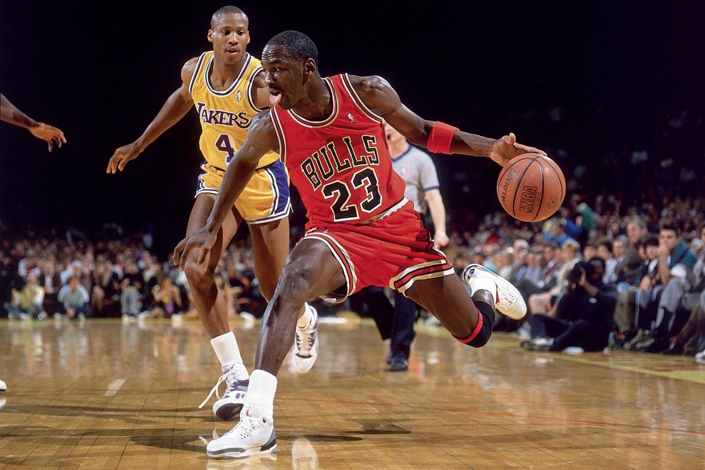Michael Jordan wearing the Air Jordan III against Byron Scott of the Lakers