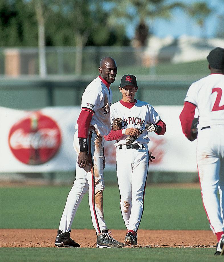 Michael Jordan and Nomar Garciaparra playing baseball with each other in the Arizona Fall League
