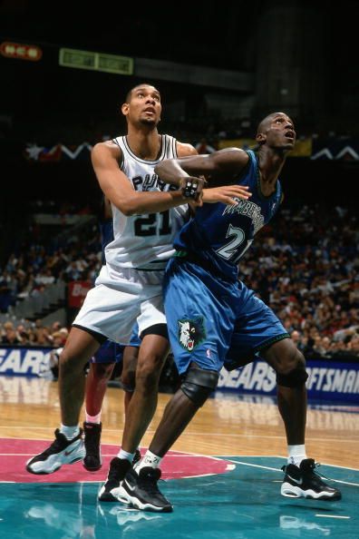 Kevin Garnett and Tim Duncan battle for position wearing the Nike Air Hype Uptempo.